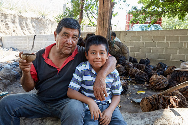 Don Rafa and his grandson at their palenque